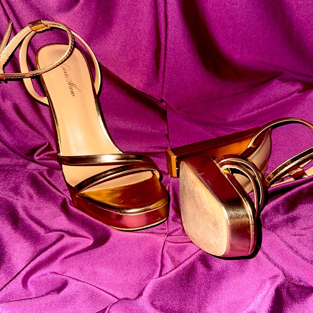 Gorgeous heels. Worn once. Fit comfortably. Easy to walk in.